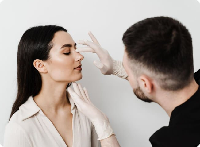 ent-doctor-is-touching-nose-consulting-girl-patient-medical-clinic-before-septoplasty-surgery-rhinoplasty-is-reshaping-nose-surgery-change-appearance-nose-improve-breathing 1